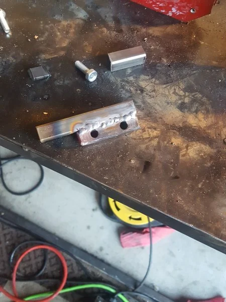 Mounting piece welded to main body.