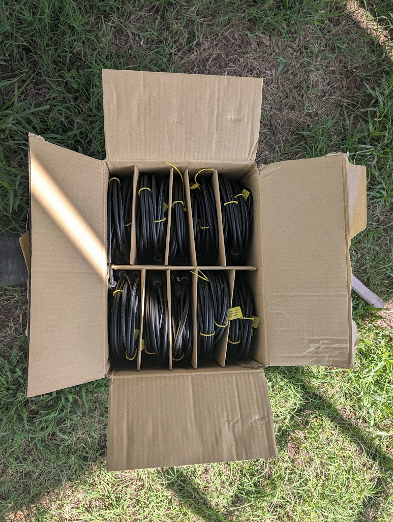 Boxes of Tigo TS4-A-O optimizers