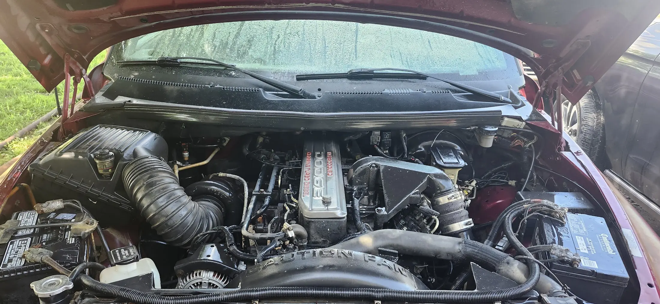 Picture showing the engine bay, with a 12v Cummins