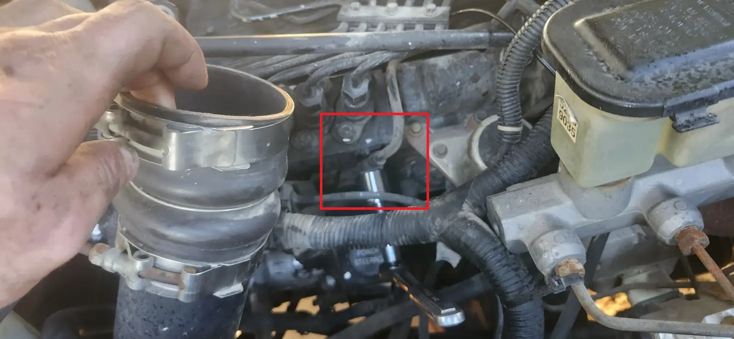 Image of the P-Pump, with the fuel banjo bolt circled in a red outline